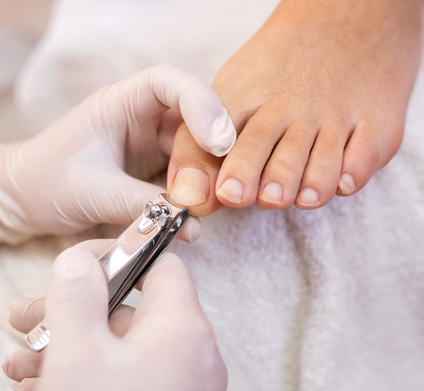 person getting their toenail cut at a podiatry office
